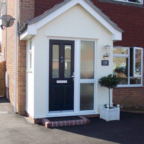 003 white porche with glazed door and windows