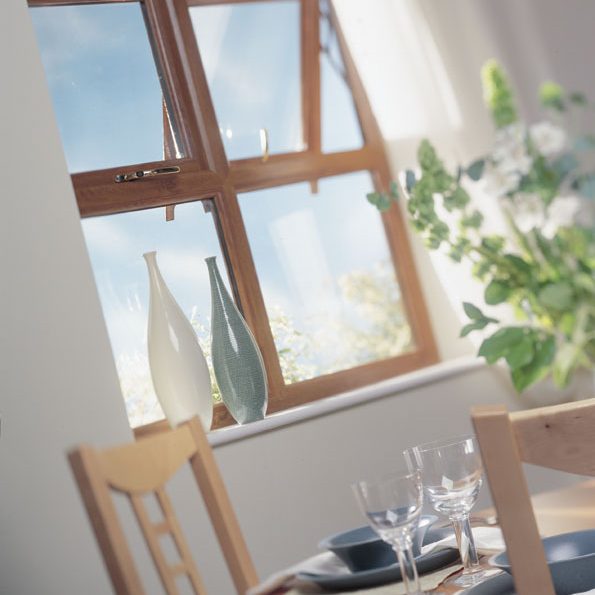 vase in front of casement windows